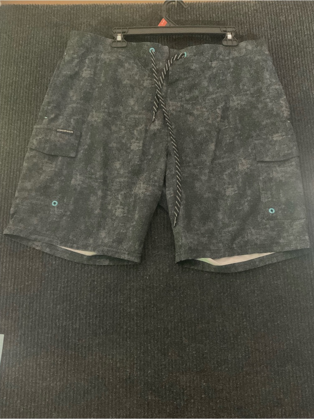 ZeroXposur Teal-Lined Black Patterned Swim Shorts